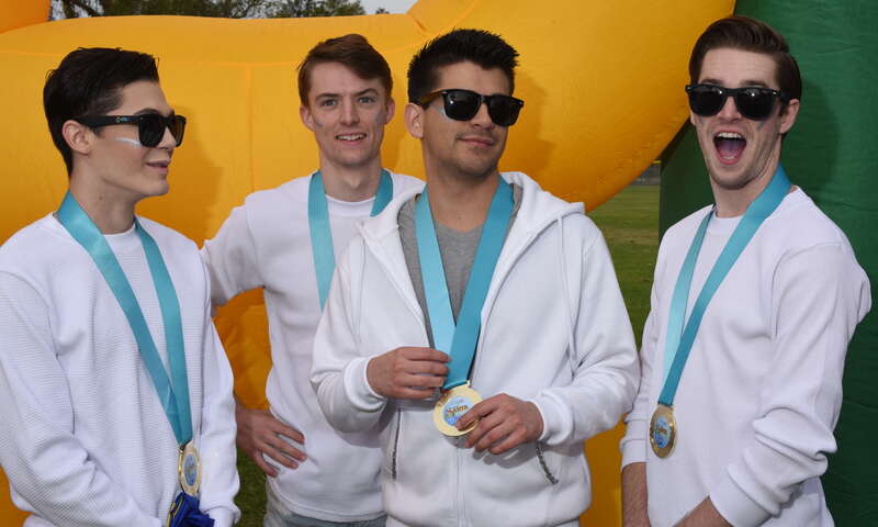 I call these guys the Silver Wolves since thay all wore gray tails and have silver makup on their cheeks. They walked the course and had a blast doing it, stopping at the various stops for a game or other activity. Here they pose with their easily