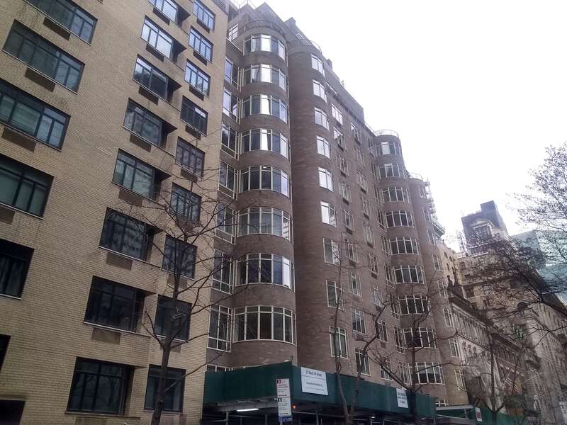 Rockefeller Apartments (center right), eastward view, on West 54th Street in Manhattan, New York, seen in March 2021.