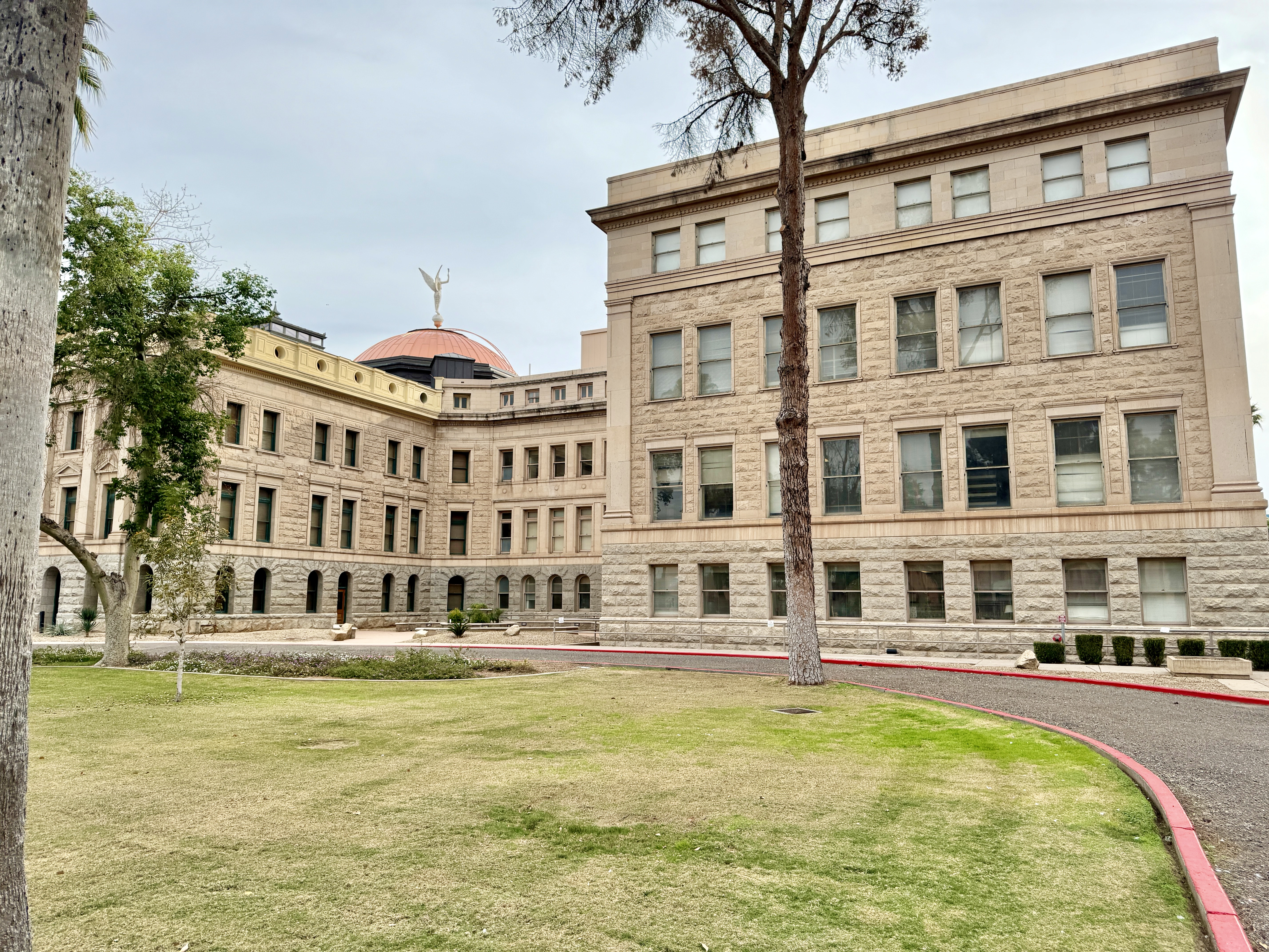Built in 1899-1901, this Beaux Arts-style building was designed by James Riely Gordon to serve as the Arizona Territorial Capitol.  The building was expanded with additions to the west (rear) of the original structure in 1918-1919, designed by A.J.