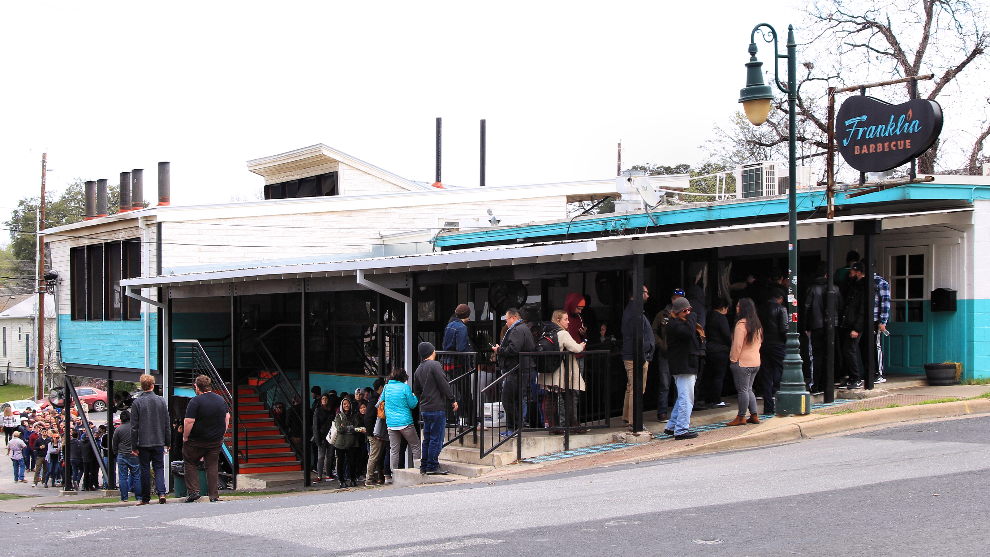 Franklin Barbecue on 11th Street in Austin, Texas, United States about to open for lunch. The line is always like this.