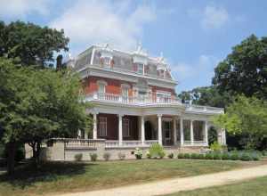 Ellwood Mansion in DeKalb (1879, remodeled 1910). Isaac Ellwood headed west from New York in 1849 during the California Gold Rush. He was somewhat successful, and returned to DeKalb to set up a hardware store with his earnings. The store was very