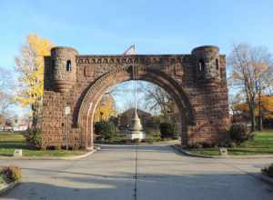 Looking east into Pershing Field Park entrance, late on a sunny day