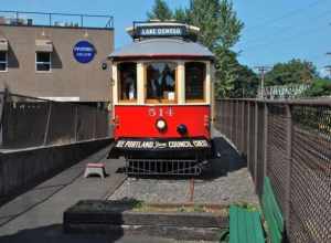 Willamette Shore Trolley car No. 514 having just arrived at the Lake Oswego terminus, on August 16, 2014, the first day of service for this type of streetcar on the Willamette Shore line. Car 514 is a 1991-built replica of a Portland "Council Crest"
