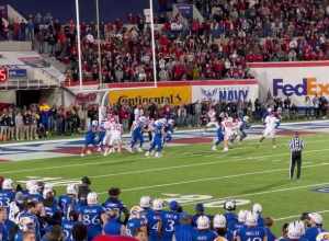 Arkansas quarterback KJ Jefferson (uniform No. 1, white) passes to Jaedon Wilson to score a two-point conversion in double overtime of the 2022 Liberty Bowl at Simmons Bank Liberty Stadium in Memphis, Tennessee.