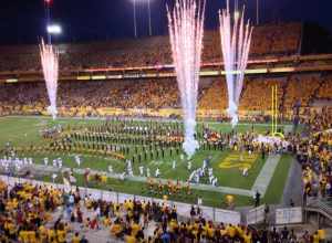ASU football team takes the field in the opening game of the 2013 season.