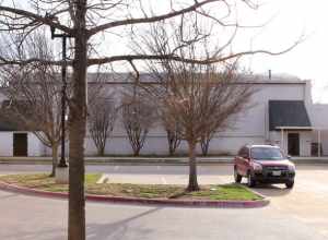 West side of the old Burleson Gymnasium in Burleson, Texas, United States.