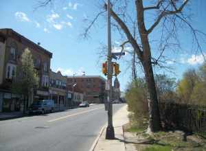 An old, odd, two-light traffic signal on the northeast corner of the intersection of South Eighth Avenue and West First Street in Mount Vernon, New York. Don't ask me why, but these had red and yellow lights, instead of red and green.As of September