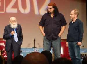 Penn &amp; Teller on stage with James Randi at The Amazing Meeting 2012 (TAM-2012) during the Saturday Keynote Presentation: "Penn &amp; Teller - 38 Years of Magic &amp; BS".