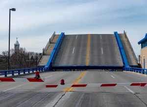Roadway view of the 8th Street Bridge (over the Sheboygan River) in Sheboygan, Wisconsin, with its bascule deck raised