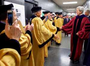 U.S. Secretary of State John Kerry greets fellow Golden Anniversary graduates before he delivers the commencement address for Northeastern University's Class of 2016 on May 6, 2016, at TD Garden in Boston, Massachusetts. [State Department photo/