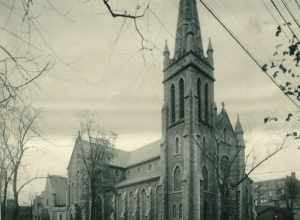 St. Patrick's Parish was formed in 1823, the first Catholic parish in Rochester. This was the third church building for the parish, which were all located at North Plymouth Avenue and Platt Street. This building was designed by Brooklyn architect