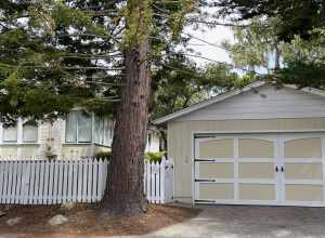 The Abbie Jane Hunter House is a historic one-and-one-half story wood-framed Queen Anne style residence, located on the northeast corner of 4th Avenue and Guadalupe Street in Carmel-by-the-Sea. The house was designed by Douglas Knox Friser and built