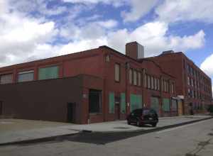 Globe Machine and Stamping Company, 1250 W. 76th St,. Cleveland, Ohio. Manufacturers of steel boxes, tumbling barrels. North end of building was divided off (?) and sold to developer for loft apartments (Shoreway Appartments, 1200 W.76th Street.