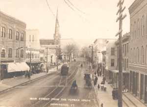 Divided back postcard of Main Street in Bennington with a streetcar, postmarked in 1912