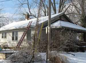 Front and southern side of the house located at 209 N. Maple Street in Bloomington, Indiana, United States.  Built in 1920, it is a part of the Bloomington West Side Historic District, a historic district that is listed on the National Register of