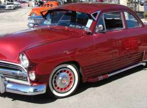 (1 in a multiple picture set)
I thought this 49? Ford couple was beautiful, and reminded me of the customized cars of my youth.