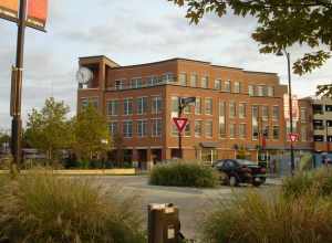 The current Amtrak terminal in Normal, Illinois. Shown here in September 2012, the facility opened in July 2012. The upper floors serve as City Hall for the Town of Normal.
