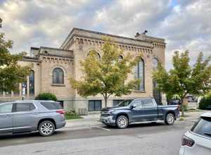 Built in 1921, this stripped and stark Romanesque Revival-style church, home to a Presbyterian congregation, stands at the corner of Central Avenue and 3rd Street in downtown Whitefish, Montana.