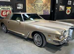A tan 1973 Stutz Blackhawk III displayed in the Stutz Car Museum in Indianapolis, Indiana, US