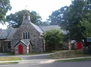 Looking south across Pelhamdale Avenue at Christ the Redeemer Episcopal Church on a mostly sunny early afternoon.