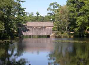 A replica of a Vermont covered bridge, this beauty transverses the Quinebaug River. The river gave power to the mills in Old Sturbridge Village for many years.