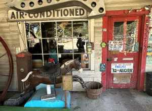 The front entrance to a self-guided tour at the Abita Springs Mystery House Museum was created by a Louisiana artist known as John Preble.