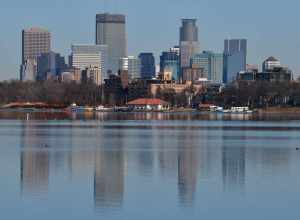 The downtown Minneapolis skyline as viewed behind the refectory at Lake Calhoun.