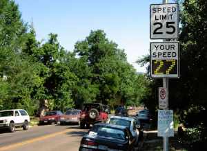 Close-up of a radar-based speed feedback sign, with the recorded speed over the limit. Looking northwards on 9th Street, Boulder, Colorado, United States. Near the junction with Cascade Avenue.