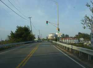 Approaching the Little Harbor Bridge is a 1942 bascule bridge carrying New Hampshire State Route 1B (and Wentworth Road) over Little Harbor, in Rye and New Castle, New Hampshire. The traffic light is for drawbridge openings.