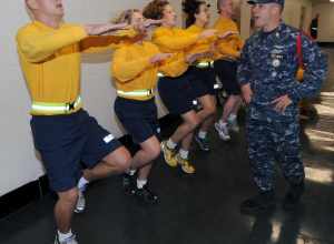 NEWPORT, R.I. (Oct. 23, 2010) Chief Aviation Warfare Systems Operator Steve Smith, a recruit division commander at Officer Candidate School, yells out a cadence to new officer candidates during a physical fitness session at Officer Training Command
