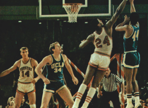 Houston's Don Chaney (#24) attempts to block a shot by UCLA's Michael Warren (#44) at the Astrodome in Houston during the 1968 Game of the Century