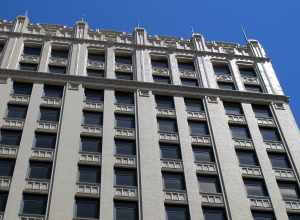 Photo of the upper-level architectural details of the Sharp Building, 206 S. 13th Street, Lincoln, Nebraska.  Photo is of the west side of the building, taken near alleyway south of "N".
