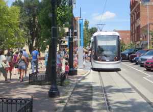 People boarding streetcar in River Market