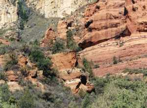 (1 of a multiple picture set.)
I took this picture from Slide Rock State Park in Oak Creek Canyon. Oak Creek has carved out a smooth chute here as it rushes down towards Sedona.  People can wiz down this natural slide going from one pond to another