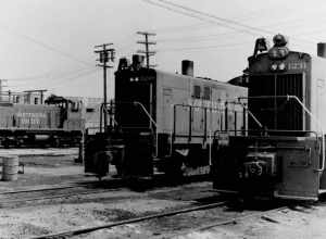 Southern Pacific ALCO S-6 #1231 &amp; #1208 and EMD SW1500 #2453 at El Centro, 8/70.