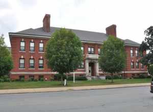 A photograph of the historic Marcia Browne Junior High School in Malden, Massachusetts.