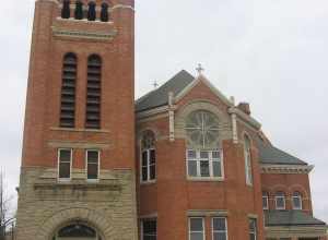 Front of the former Ashland Avenue Baptist Church (now Ebenezer Missionary Baptist Church), located on the northwestern corner of the junction of Ashland and Woodruff Avenues in Toledo, Ohio, United States.  Built in 1895, it is listed on the