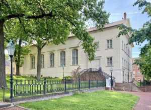 Built between 1803 and 1806, this Classical Revival-style church was built to serve the Moravian community in Bethlehem, which settled in the area during the mid-18th Century.  The building features a simple stucco-clad exterior with six-over-six and