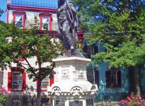 Statue of Lawrence the Indian, savior of Schenectady, NY, USA, at the center of the city's Stockade Historic District.