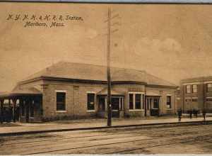 Undivided back postcard of Marlboro station on the New Haven Railroad. The tracks in the foreground were used by the Boston and Worcester Street Railway's Hudson Branch.