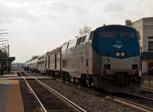 Amtrak 50, the Cardinal has arrived in Manassas, Virginia on a Friday evening to pickup and discharge passengers. Amtrak runs on Norfolk Southern rails through Manassas as does Virginia Railway Express, the local commuter railway.