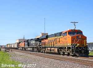 Burlington Northern Santa Fe 7167(ES44C4), Norfolk Southern 9957(C40-9W) and 5101(C44-9W) Leads a Manifest Northbound on the BNSF Fort Scott Sub just before the CP 215 Signals near Dennis Avenue Crossing East of Keeler Street in Olathe, Kansas.
Video