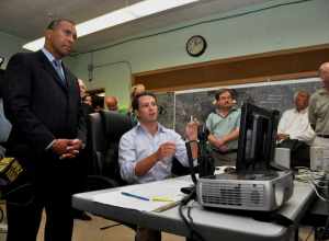 Governor Patirck listens as Andy Paul, a MassDOT Traffic Engineer, explains how engineers monitor and manage traffic while the 93 Fast 14 bridges are being constructed. 
The 93 Fast 14 Project is the perfect example of how the Patrick-Murray
