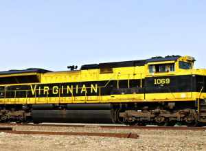 Norfolk Southern 1069(SD70ACe) Virginian Heritage Unit along with Burlington Northern Santa Fe 8942(SD70MAC) are DPU power a Northbound Empty Coal Drag seen here just north of CP Rosedale on the BNSF Fort Scott Sub. The lead units are Burlington