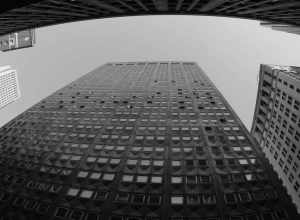 Downtown Pittsburgh PA.  Faced with aluminum panels and designed with windows that rotate outward.  Fisheye perspective, B&amp;W image.